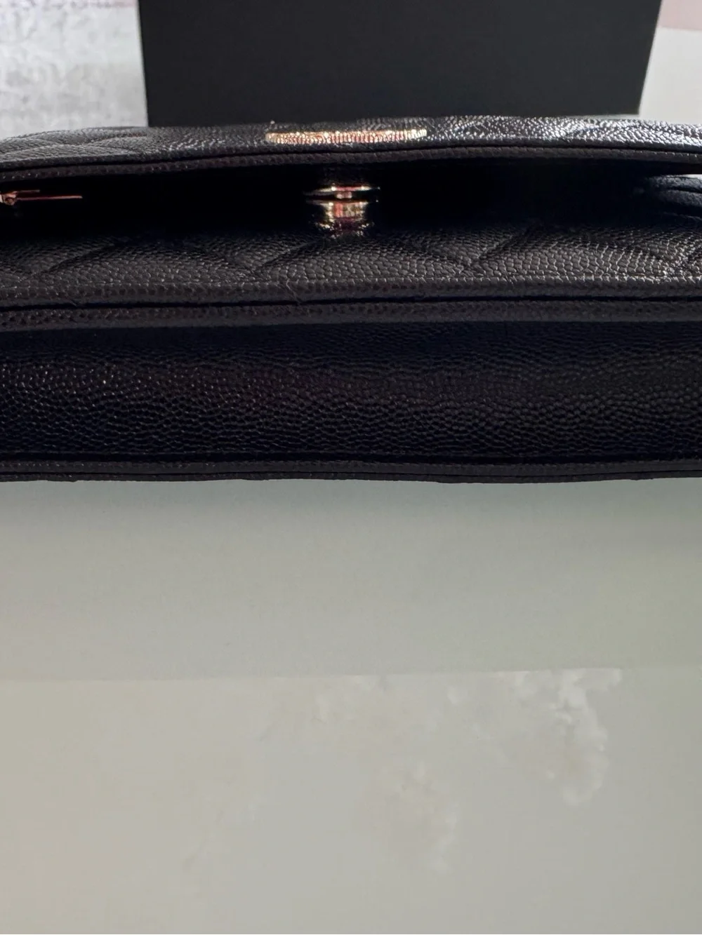 CHANEL WOC Black caviar leather with Gold Hardware and heart shaped crystal logo